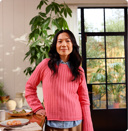 Portrait of a smiling asian premenopausal woman used for MONALEESA-7 breast cancer study design.